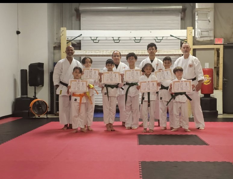 Students holding certificates